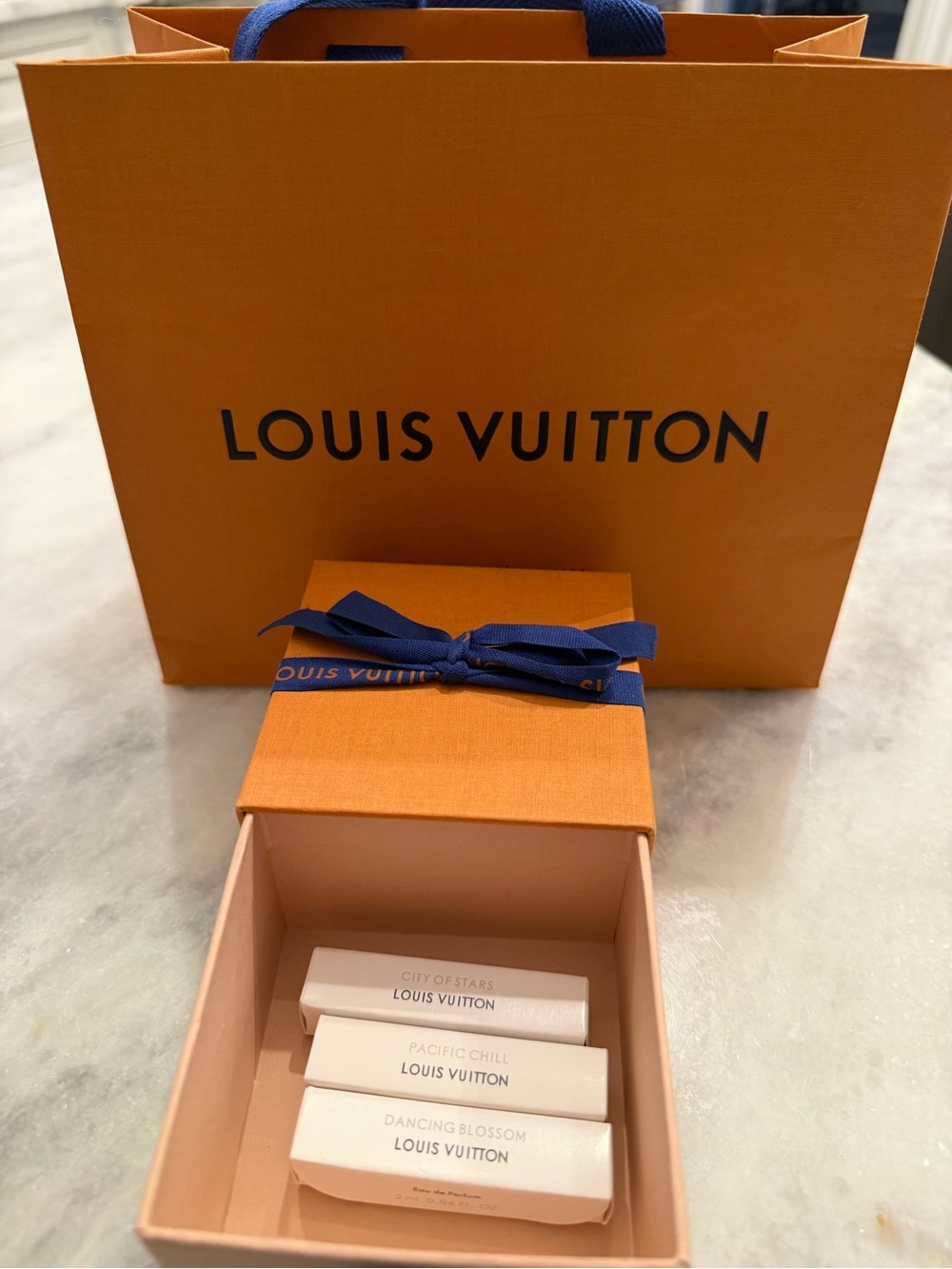 Louis Vuitton Box and Shopper’s Bag Bundle
